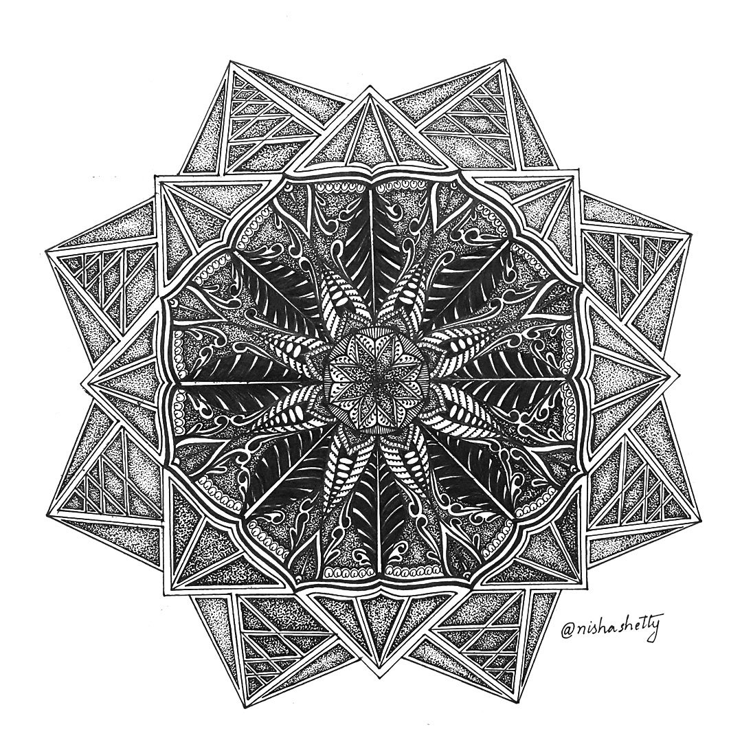 Hand-drawn black and white mandala art piece by Nisha Shetty, featuring intricate geometric of Dotwork Mandala and symmetrical patterns.